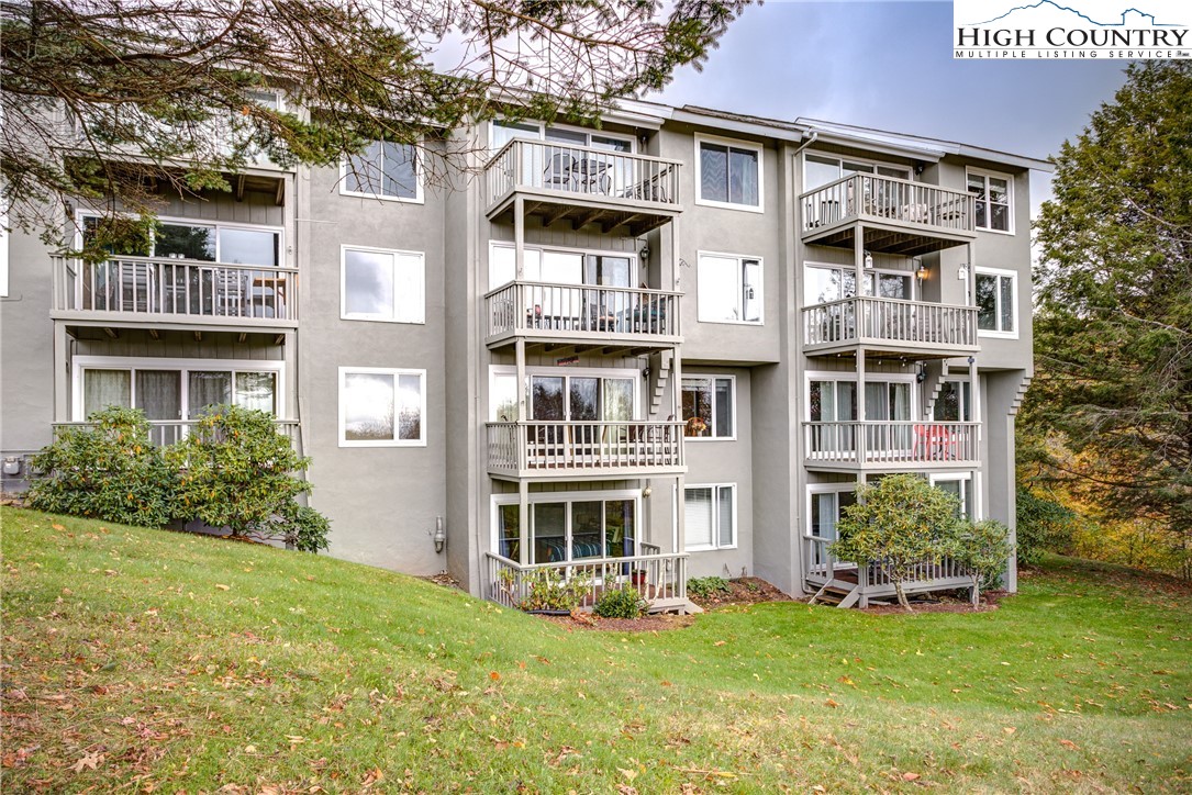 367 Skyleaf Drive, Unit D8 Banner Elk, NC 28604 - Photo 29 of 43 a house view with a garden space