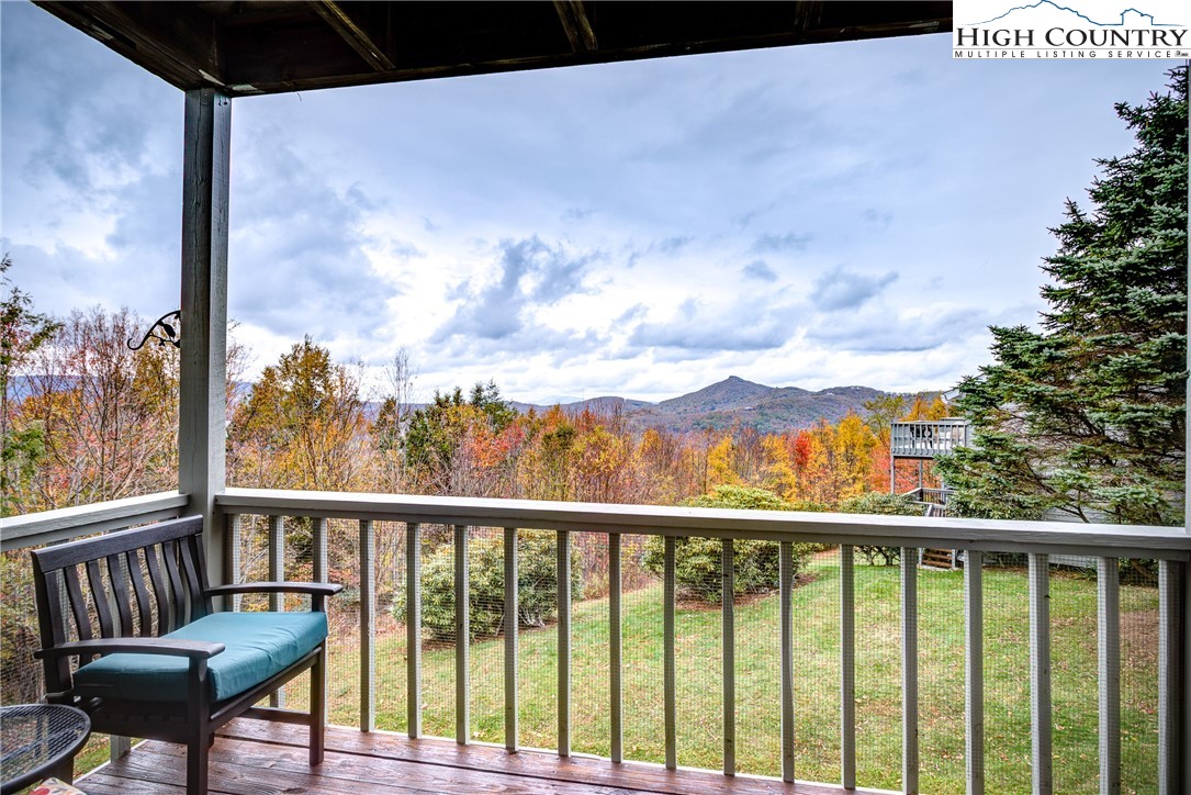 367 Skyleaf Drive, Unit D8 Banner Elk, NC 28604 - Photo 5 of 43 a view of a balcony with chairs