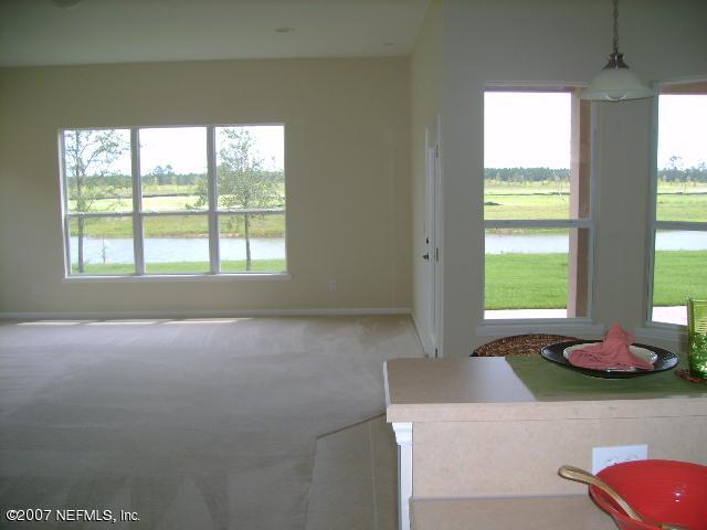 651 Porta Rosa Circle St. Augustine, FL 32092 - Photo 5 of 35 Kitchen view to Family Room