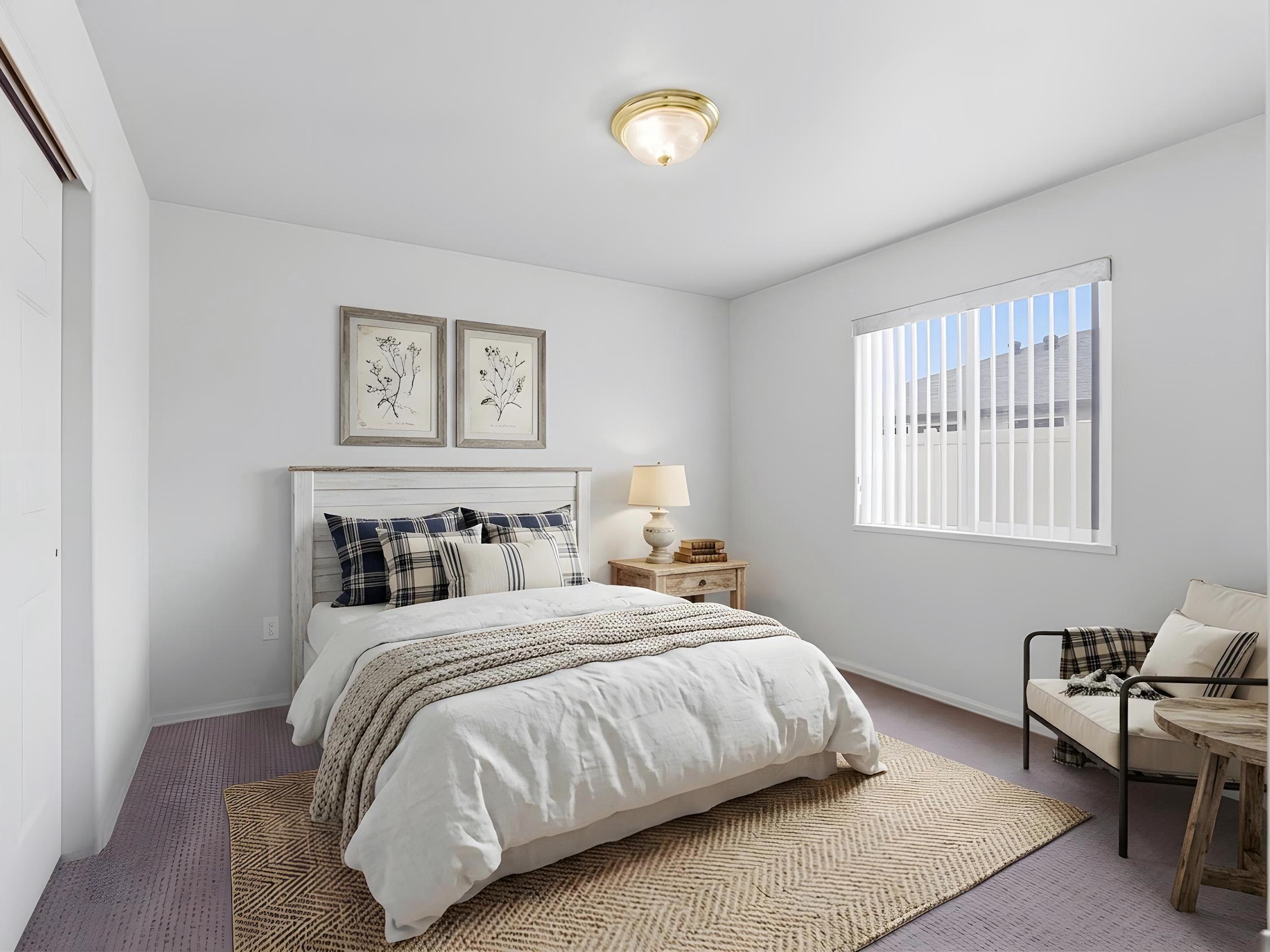 3082 Shadowbrook Court Grand Junction, CO 81504 - Photo 17 of 28 a bedroom with a bed and a window