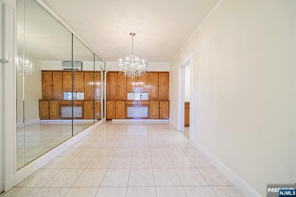 1585 Bergen Boulevard Leonia, NJ 07605 - Photo 21 of 50 a view of a livingroom with a chandelier