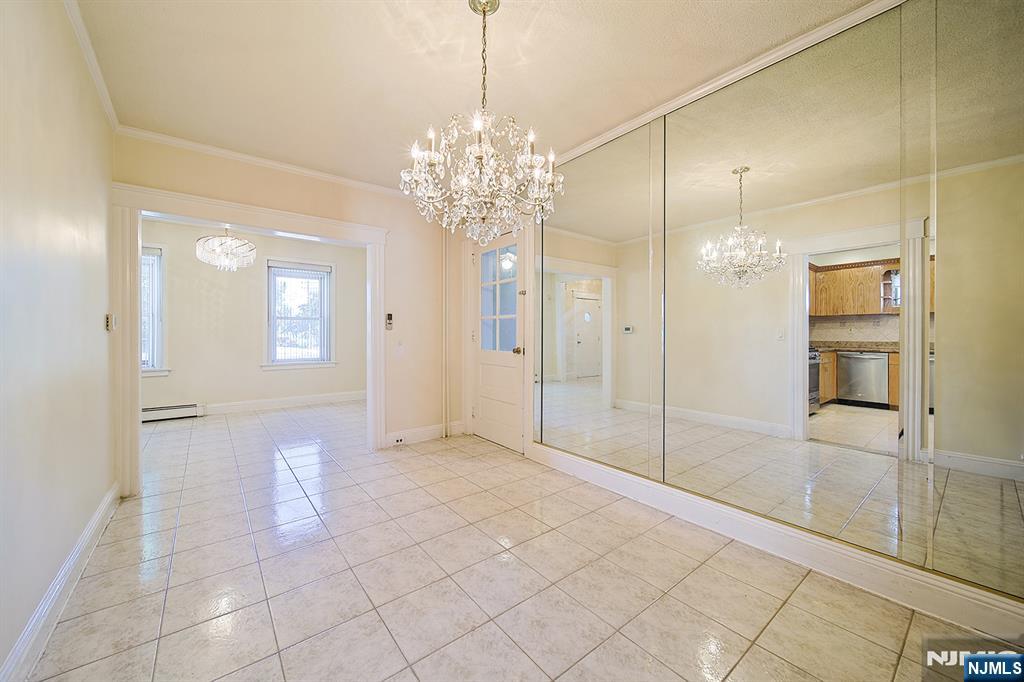 1585 Bergen Boulevard Leonia, NJ 07605 - Photo 24 of 50 a view of a bathroom with a shower and a sink