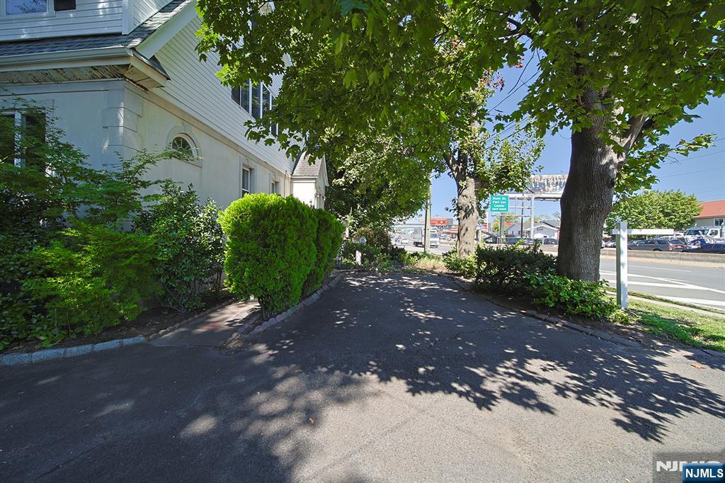 1585 Bergen Boulevard Leonia, NJ 07605 - Photo 4 of 50 a view of a house with a tree