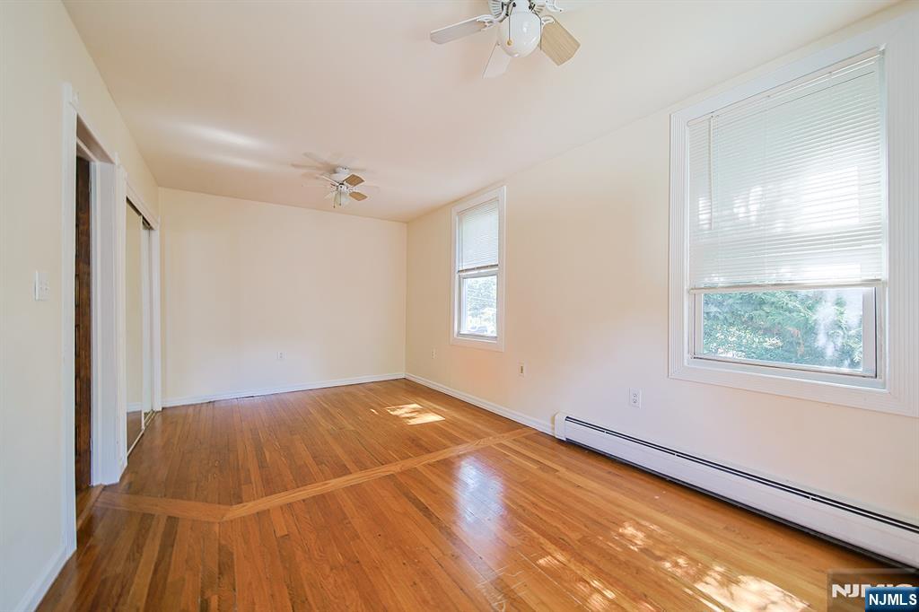 1585 Bergen Boulevard Leonia, NJ 07605 - Photo 41 of 50 a view of a room with wooden floor and windows