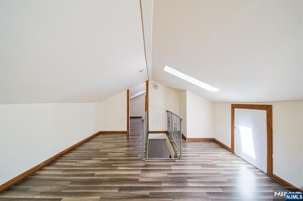 1585 Bergen Boulevard Leonia, NJ 07605 - Photo 44 of 50 a view of empty room with wooden floor