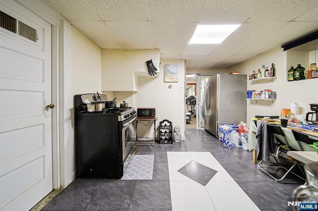 1585 Bergen Boulevard Leonia, NJ 07605 - Photo 48 of 50 a living room with furniture and a flat screen tv