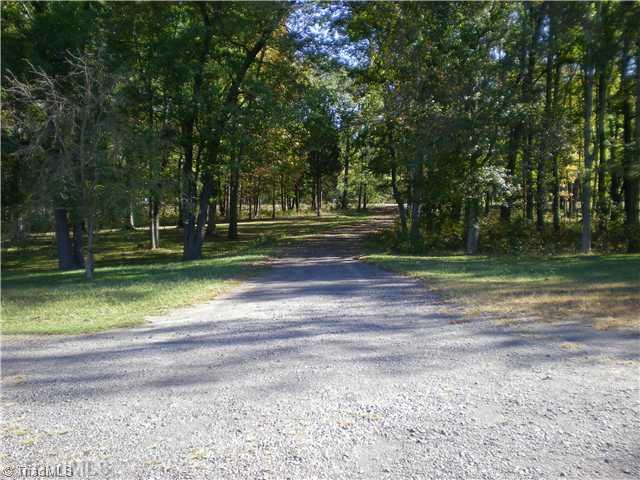 211 Rainbow Road Advance, NC 27006 - Photo 2 of 3 Land. Drive way into Acreage.