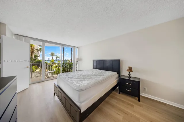 a bathroom with a sink toilet and a mirror