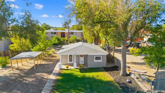 a front view of a house with yard