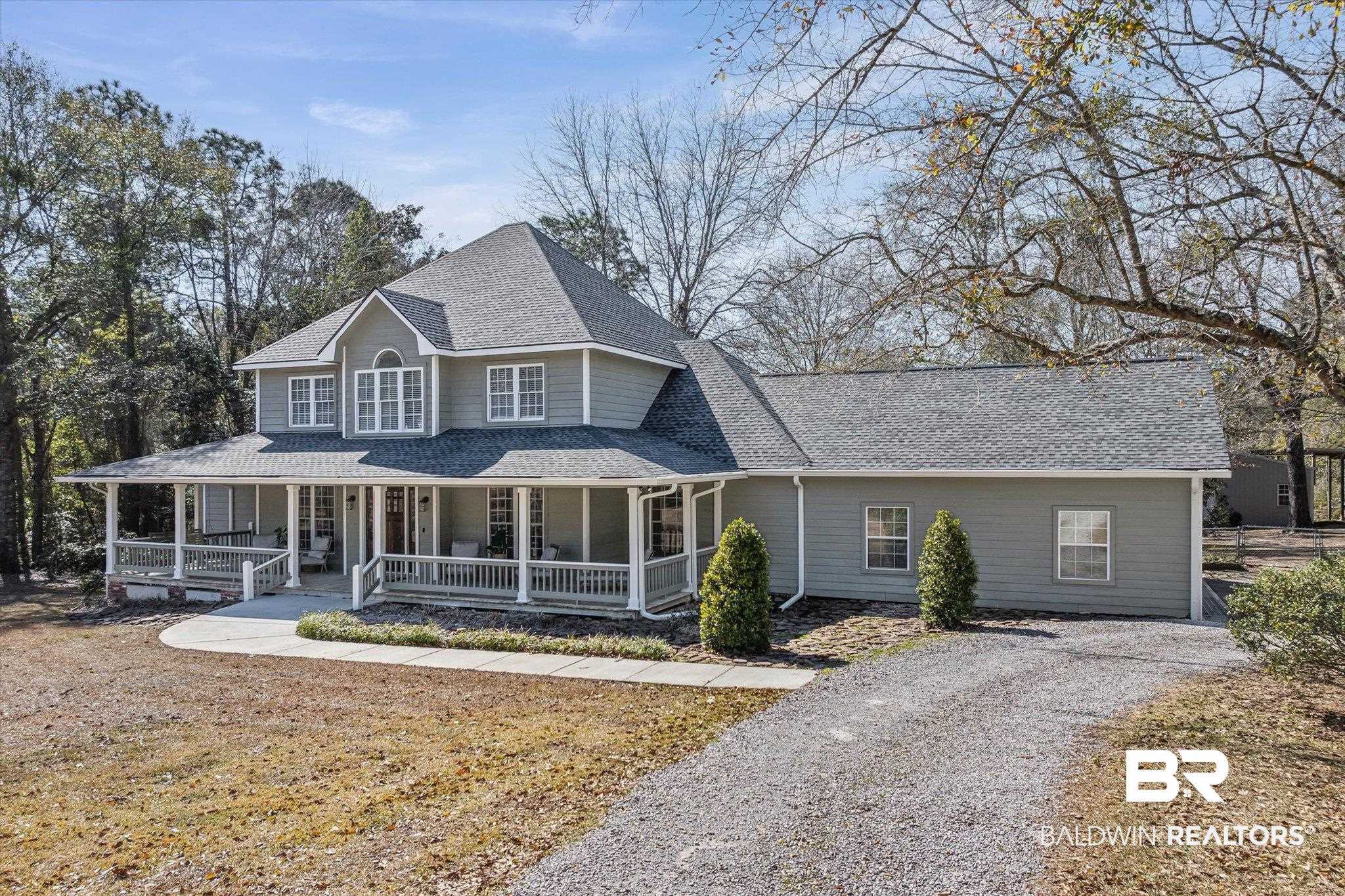 31369 Blakeley Way Daphne, AL 36527 - Photo 33 of 38 View of front of property featuring roof with shingles, covered porch, and driveway