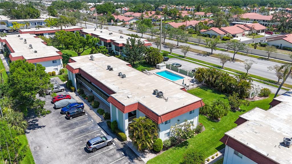 3602 South Beneva Road, Unit 405 Sarasota, FL 34232 - Photo 1 of 1 an aerial view of a houses with yard
