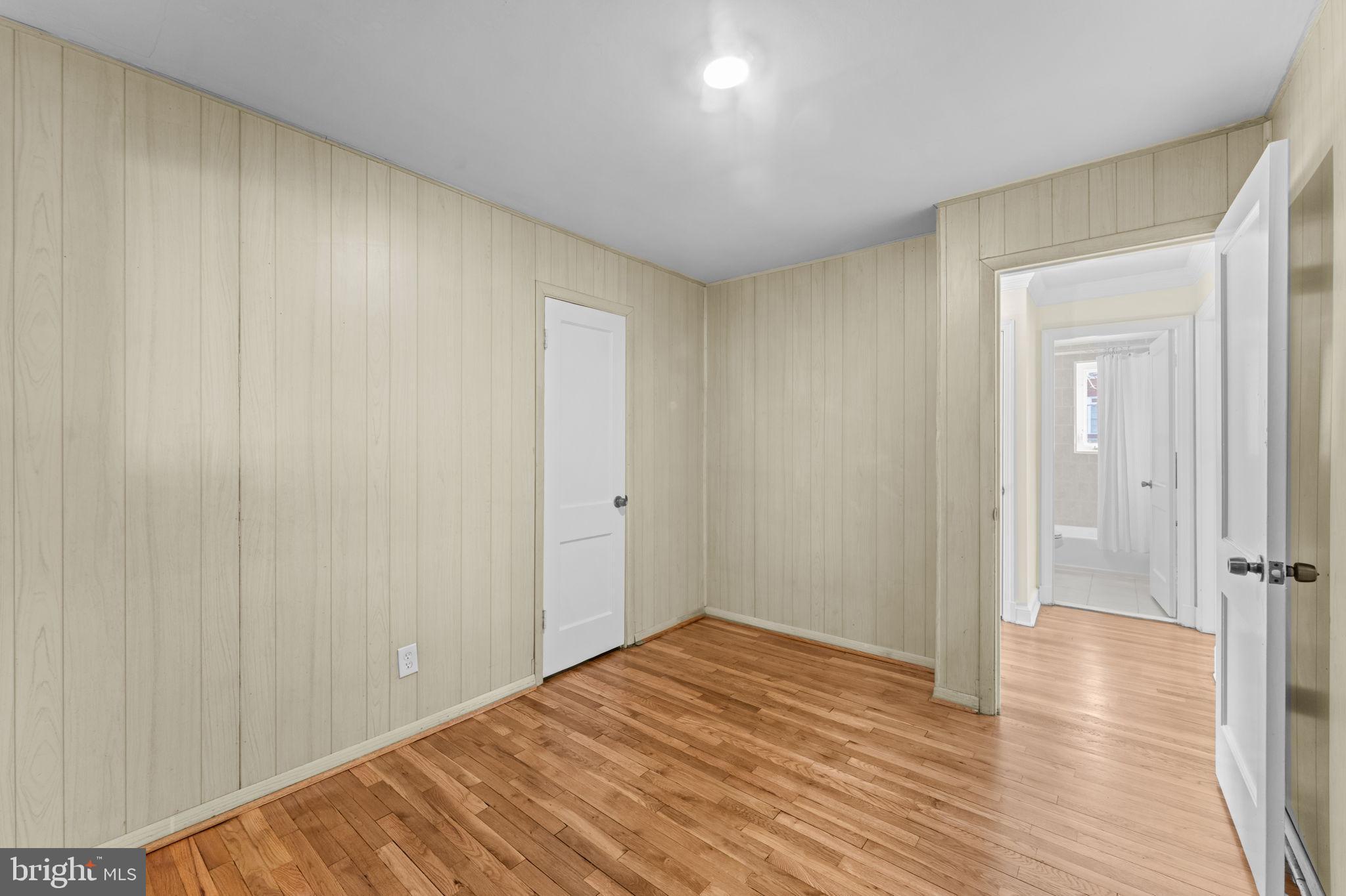 11013 Amherst Avenue Silver Spring, MD 20902 - Photo 24 of 74 a view of a room with wooden floor and bathroom