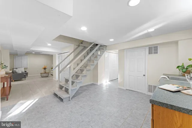 a living room with furniture and a couch