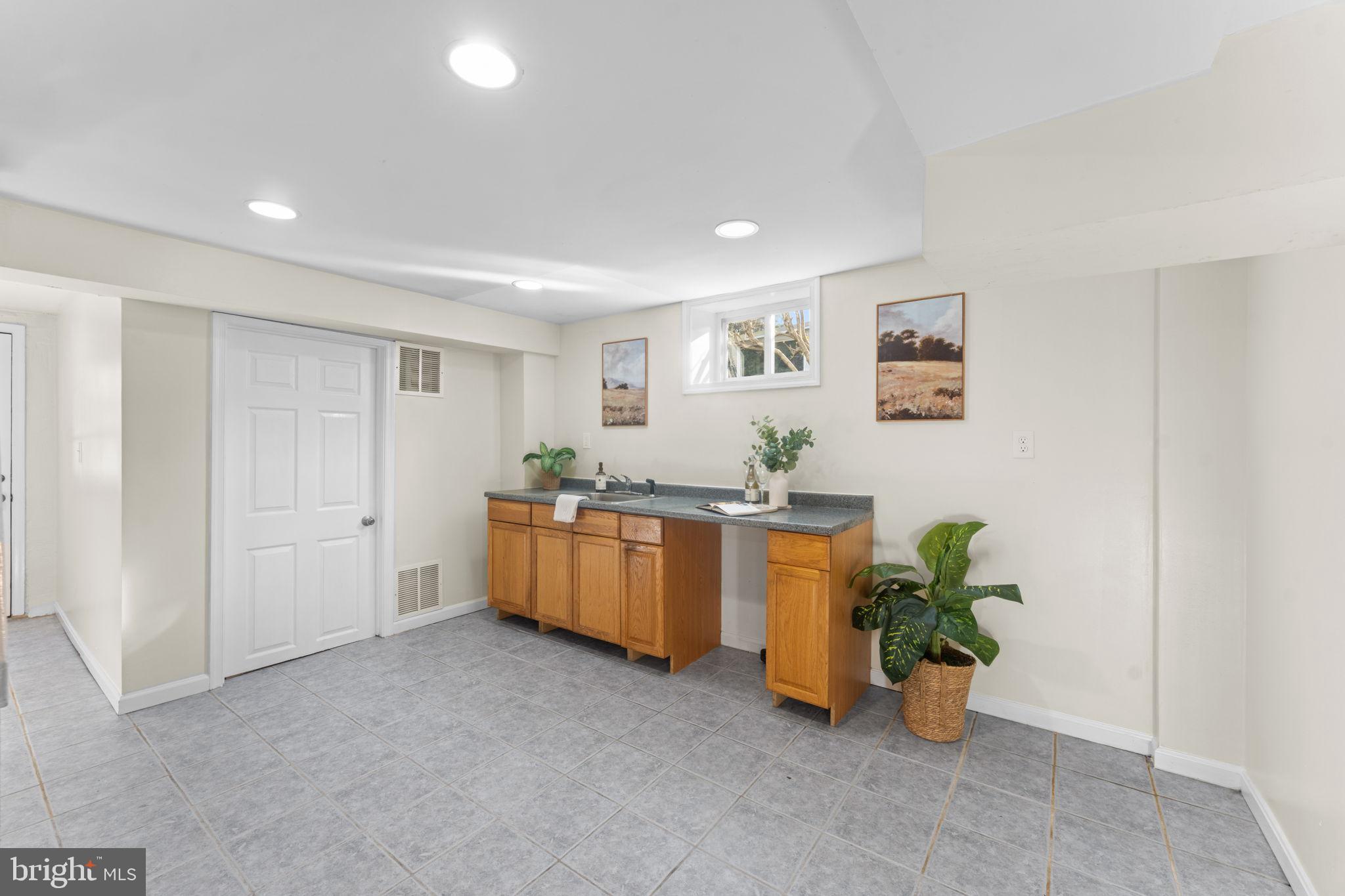 11013 Amherst Avenue Silver Spring, MD 20902 - Photo 28 of 74 Bright and spacious basement retreat.