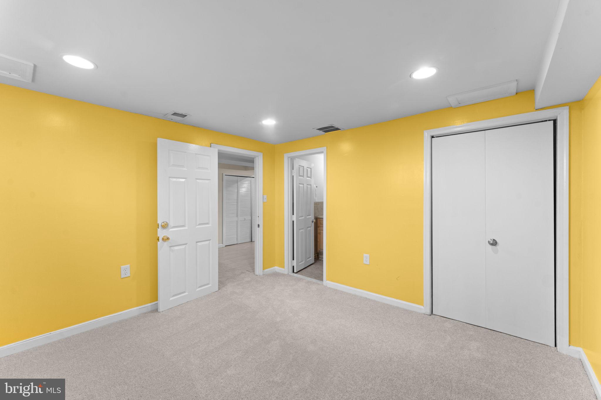 11013 Amherst Avenue Silver Spring, MD 20902 - Photo 39 of 74 a view of an empty room with a window