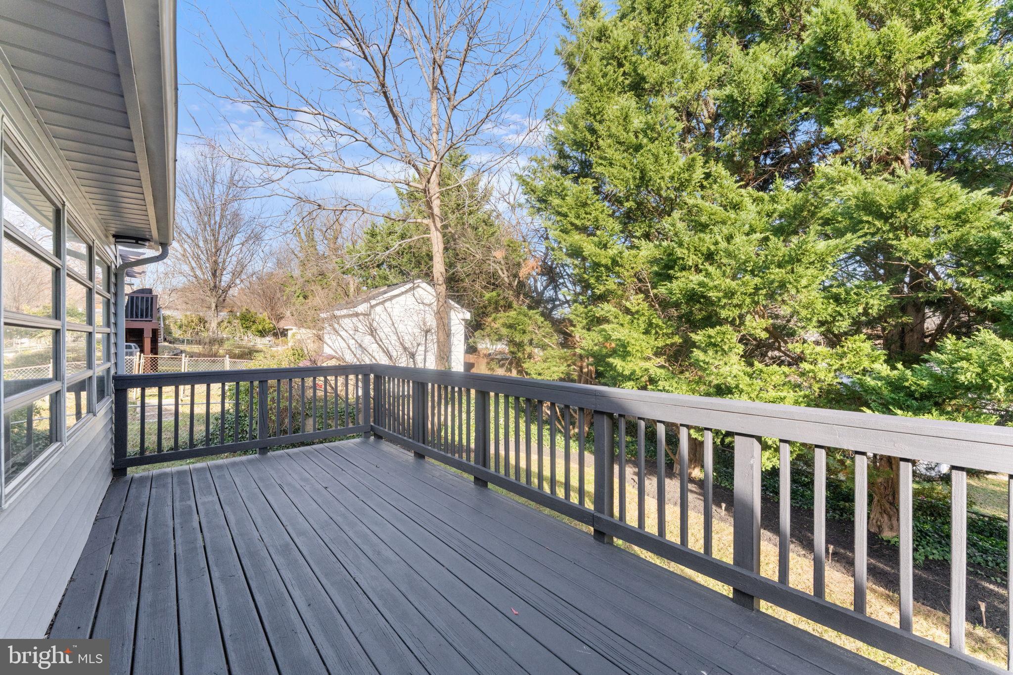 11013 Amherst Avenue Silver Spring, MD 20902 - Photo 49 of 74 a view of balcony with wooden floor