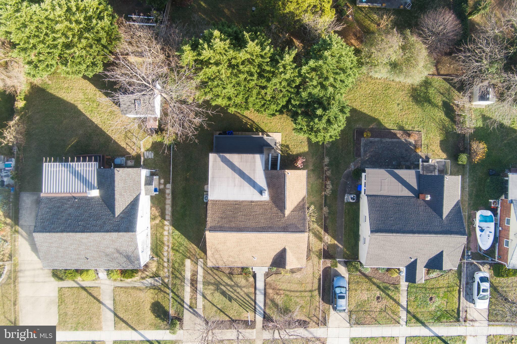 11013 Amherst Avenue Silver Spring, MD 20902 - Photo 52 of 74 a front view of a house with a yard