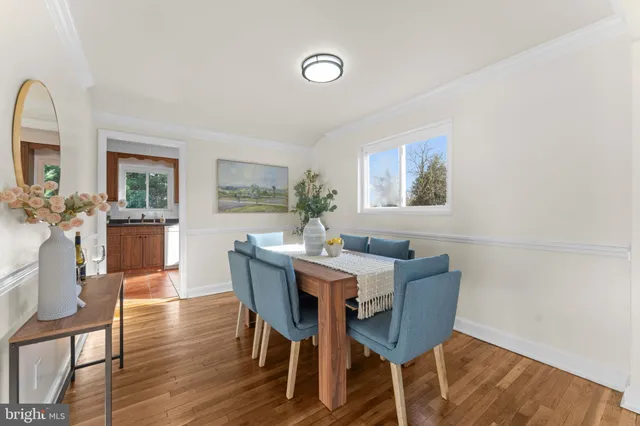 a kitchen with granite countertop a stove and a refrigerator