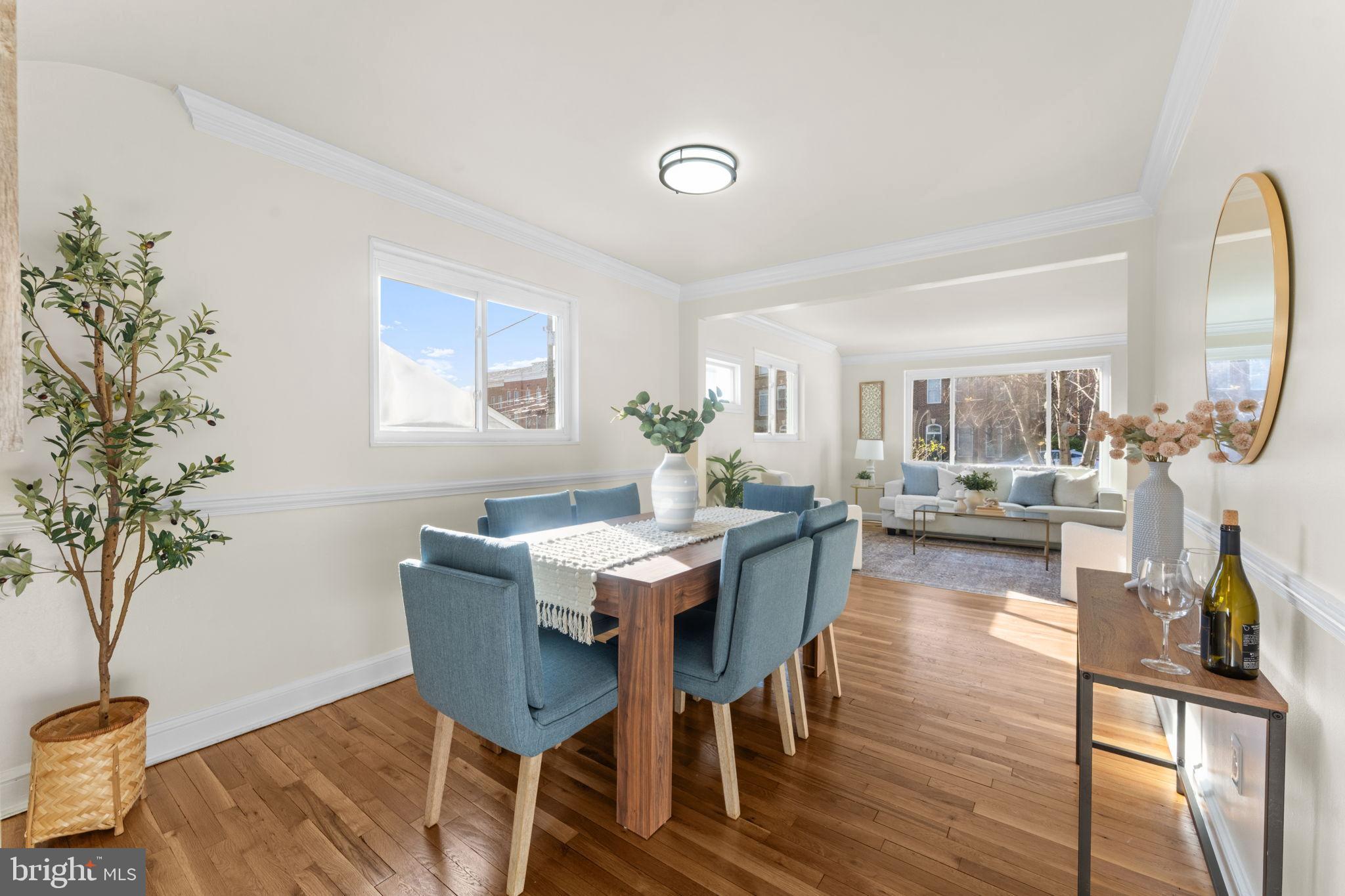 11013 Amherst Avenue Silver Spring, MD 20902 - Photo 9 of 74 a view of a dining room with furniture and wooden floor