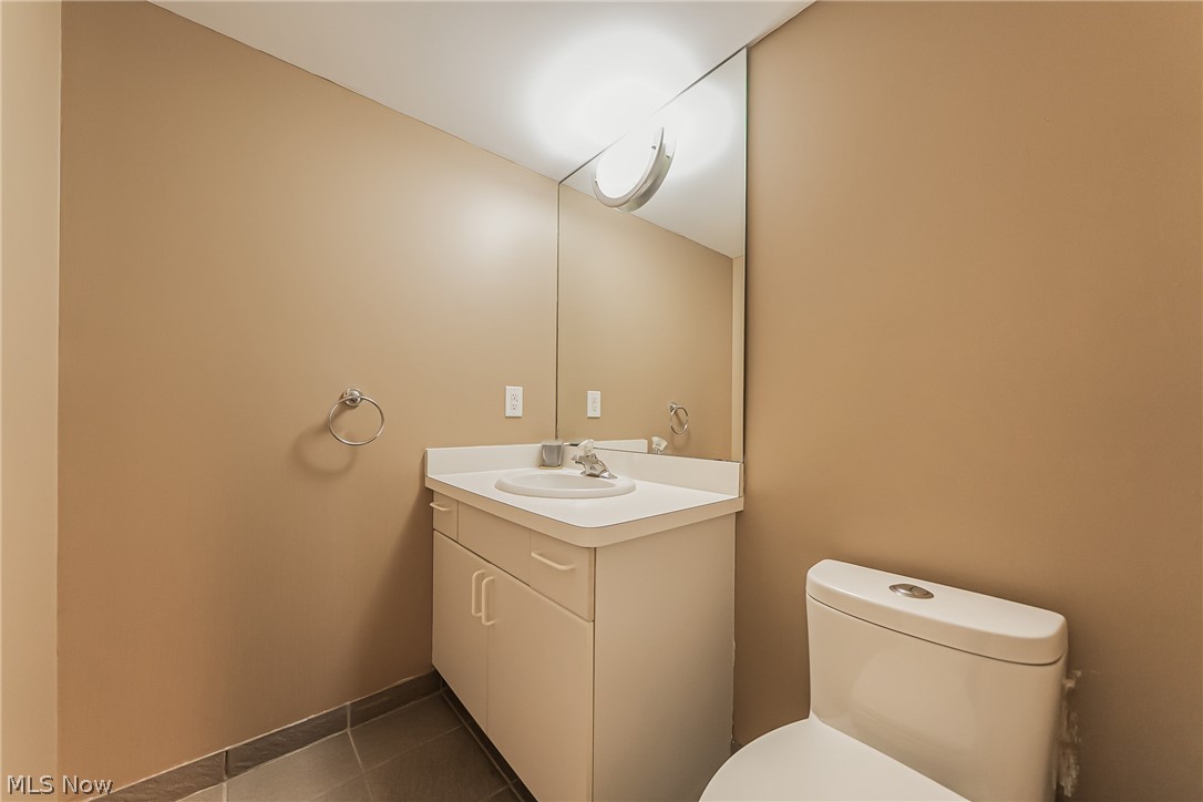 3510 Hampton Road Pepper Pike, OH 44122 - Photo 25 of 31 Bathroom with tile floors, vanity, and toilet
