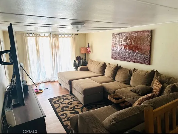 a bed room with a bed and a couch