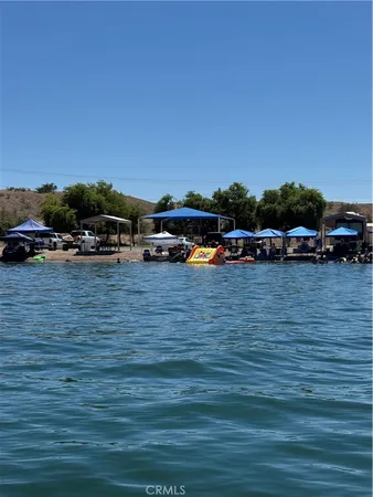 a view of a swimming pool with a chairs