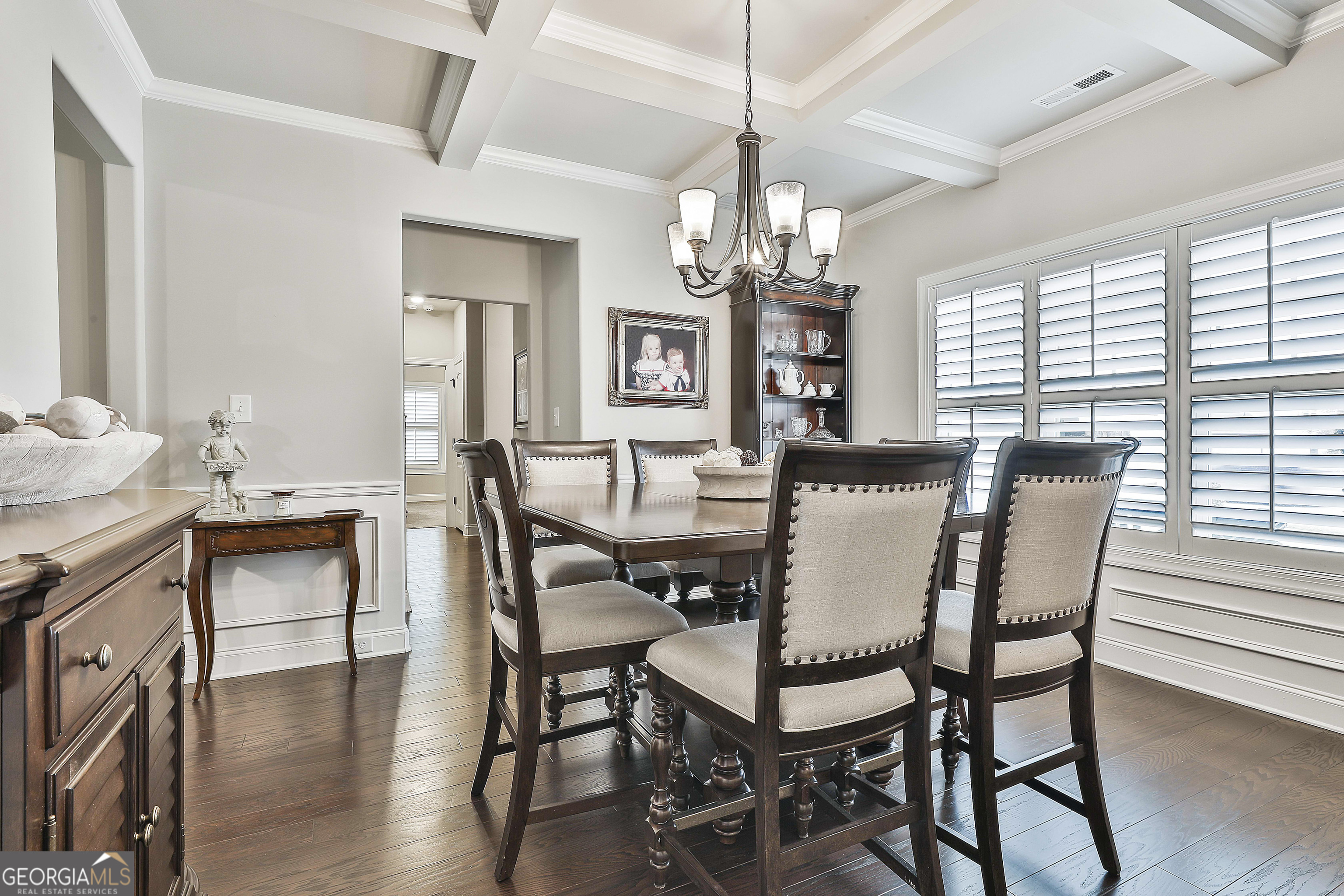 155 Wet Stone Road Senoia, GA 30276 - Photo 21 of 46 a view of a dining room with furniture window and wooden floor
