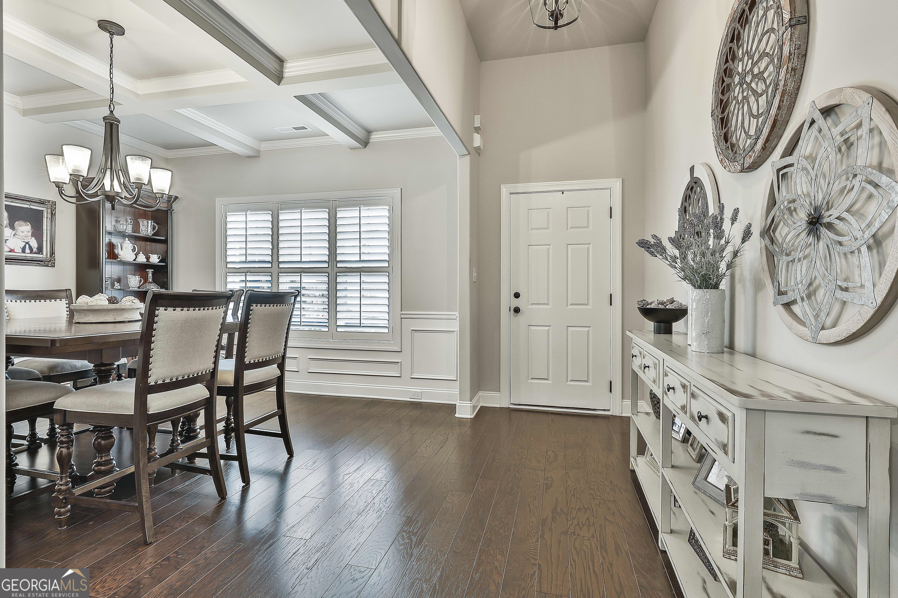 155 Wet Stone Road Senoia, GA 30276 - Photo 8 of 46 a view of a dining room with furniture window and wooden floor