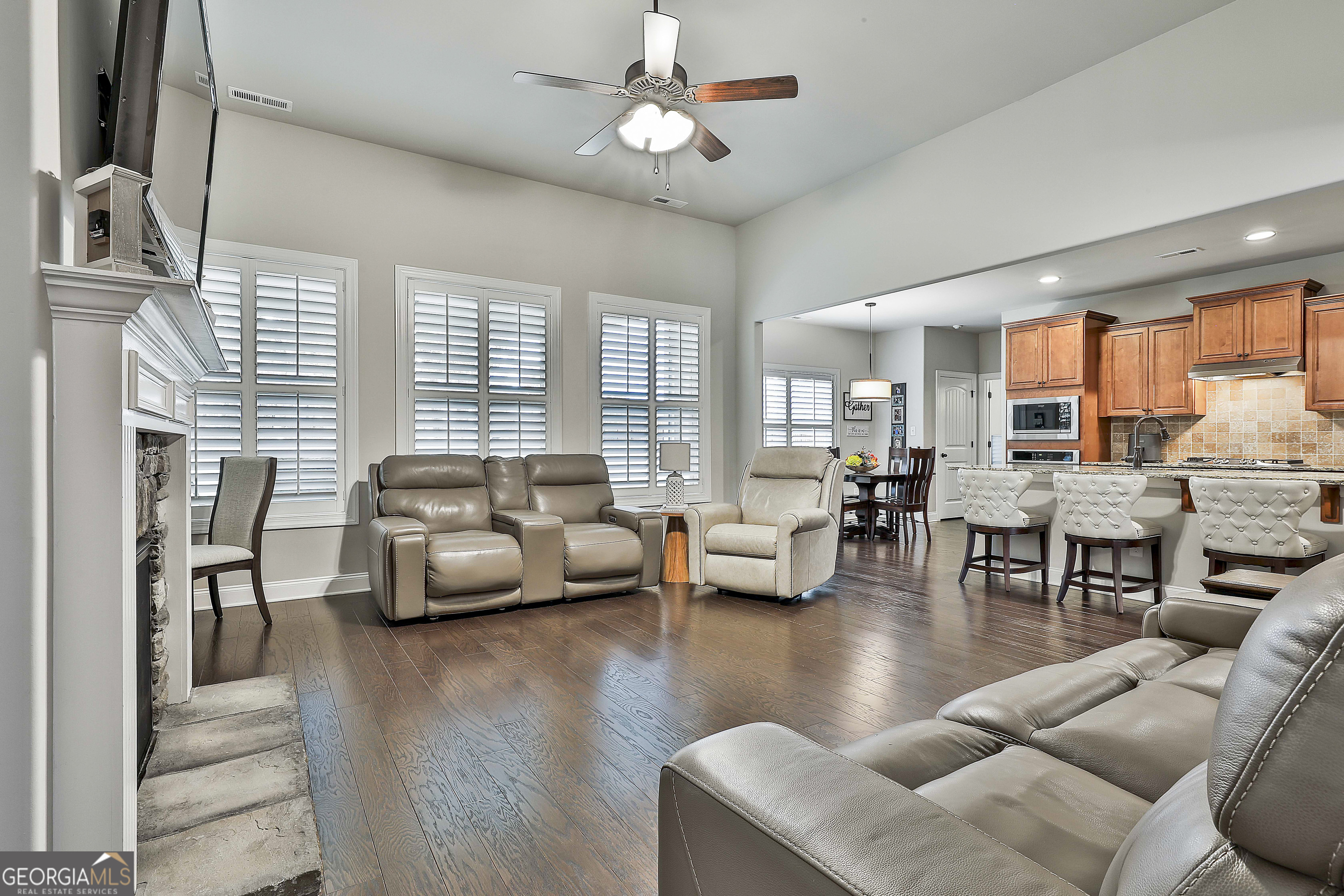 155 Wet Stone Road Senoia, GA 30276 - Photo 9 of 46 a living room with furniture and a large window