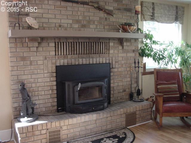 5565 Jason Road Colorado Springs, CO 80908 - Photo 15 of 27 Living Room Warmth