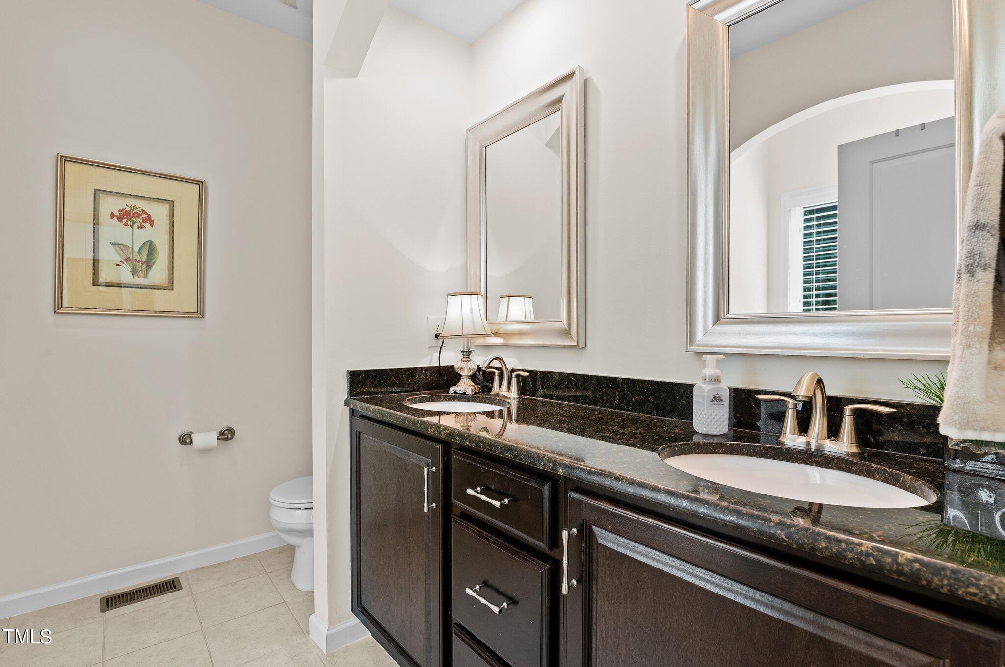 5657 Wade Park Boulevard Raleigh, NC 27607 - Photo 11 of 24 Primary Bathroom with Double Sinks.