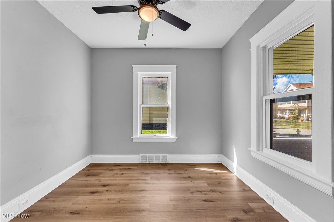 4408 Alpha Avenue Cleveland, OH 44105 - Photo 22 of 41 Spare room featuring light wood-type flooring and ceiling fan