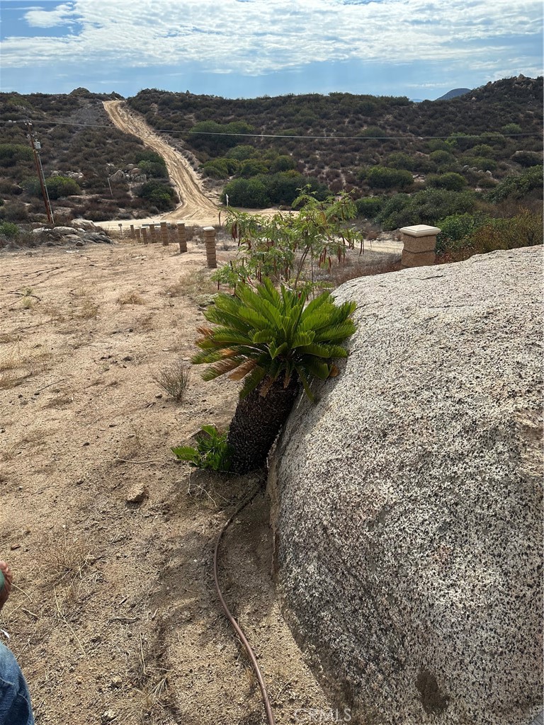 41720 Oak Canyon Road Hemet, CA 92544 - Photo 22 of 60 a view of a lake with a mountain