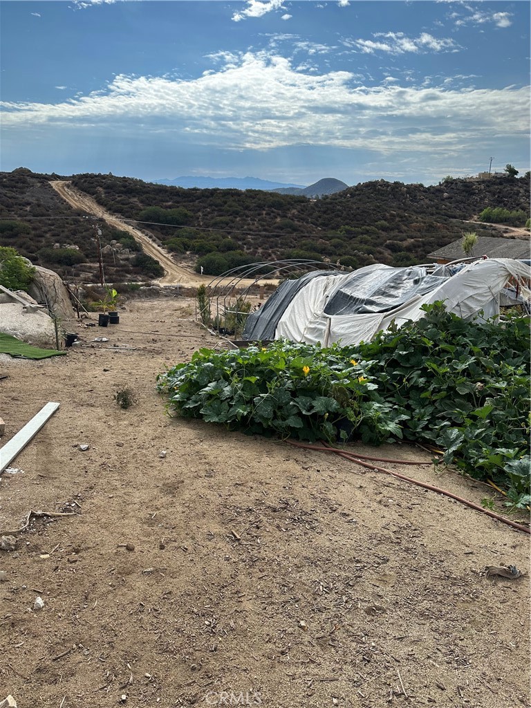 41720 Oak Canyon Road Hemet, CA 92544 - Photo 30 of 60 a view of a lake with mountain