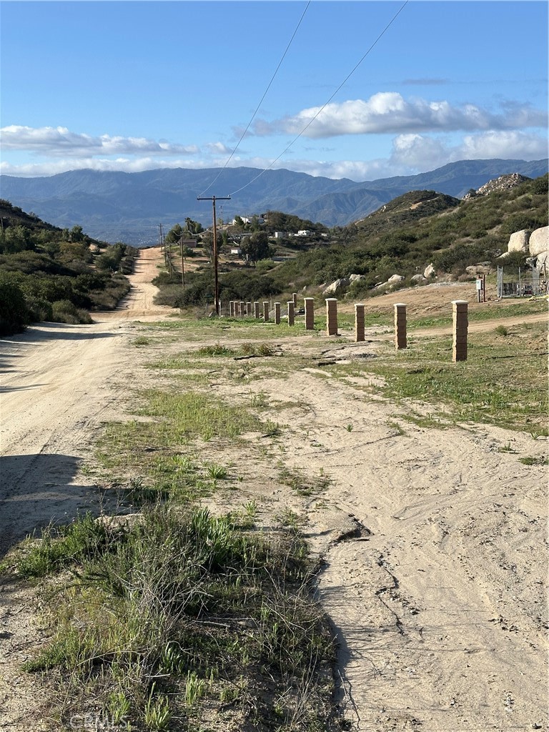 41720 Oak Canyon Road Hemet, CA 92544 - Photo 41 of 60 a view of a lake with a mountain