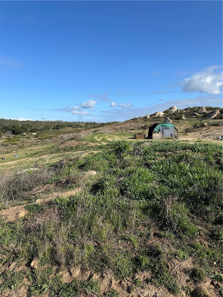 41720 Oak Canyon Road Hemet, CA 92544 - Photo 44 of 60 a view of a large building with an outdoor space