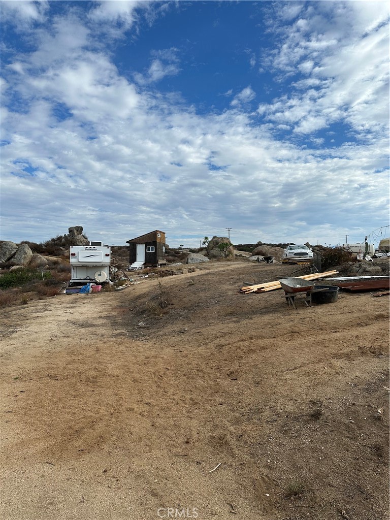 41720 Oak Canyon Road Hemet, CA 92544 - Photo 60 of 60 a view of car parked in middle of a field