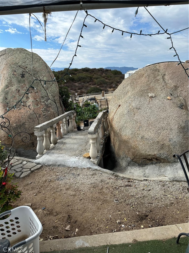 41720 Oak Canyon Road Hemet, CA 92544 - Photo 6 of 60 Bridge between decorative boulders.