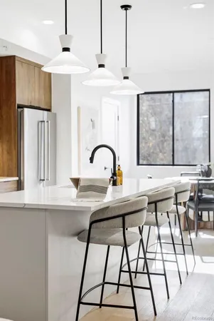 a kitchen with a stove and cabinets