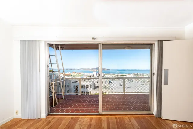 a view of a living room with furniture