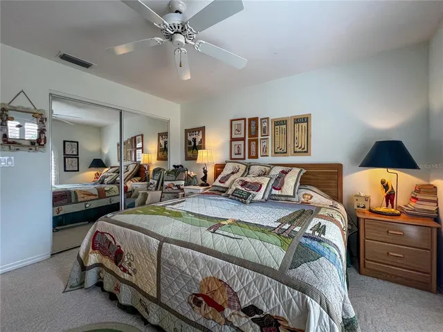 a bed room with a bed and dresser