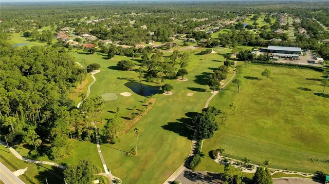 a view of a lake with a yard and lake view