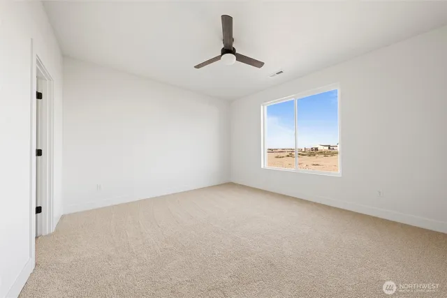 a bathroom with a double vanity sink a mirror and a shower