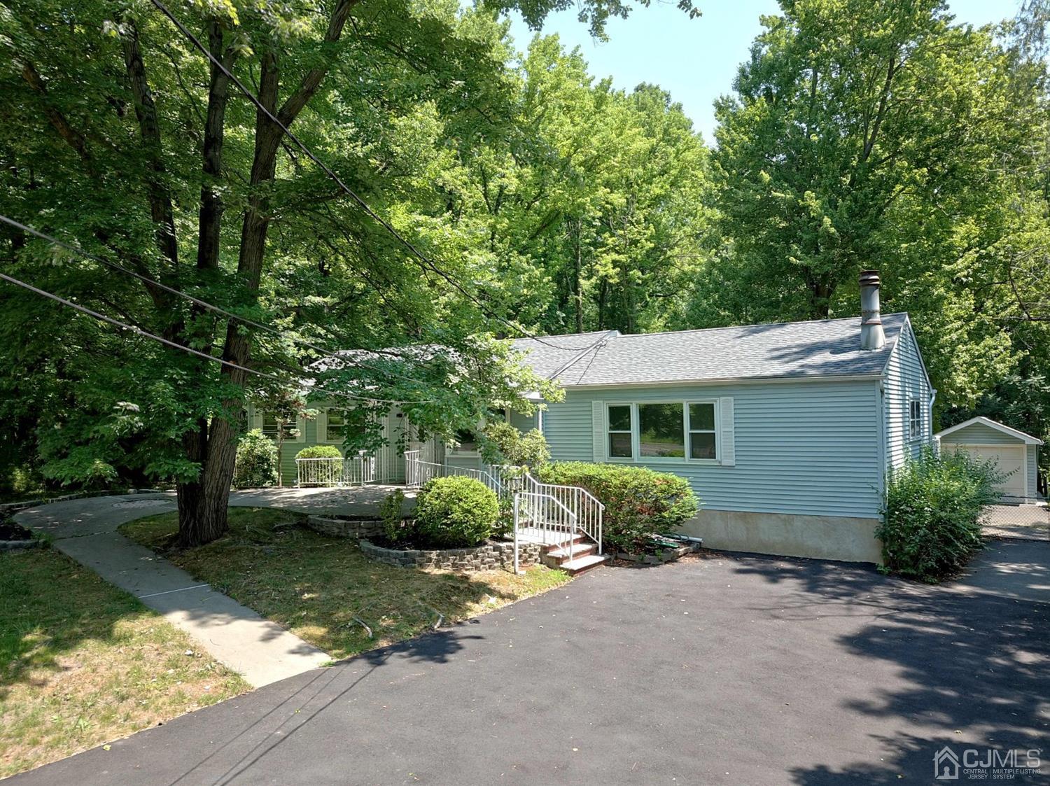 238 New Road Monmouth Junction, NJ 08852 - Photo 2 of 63 a view of a house with a garden