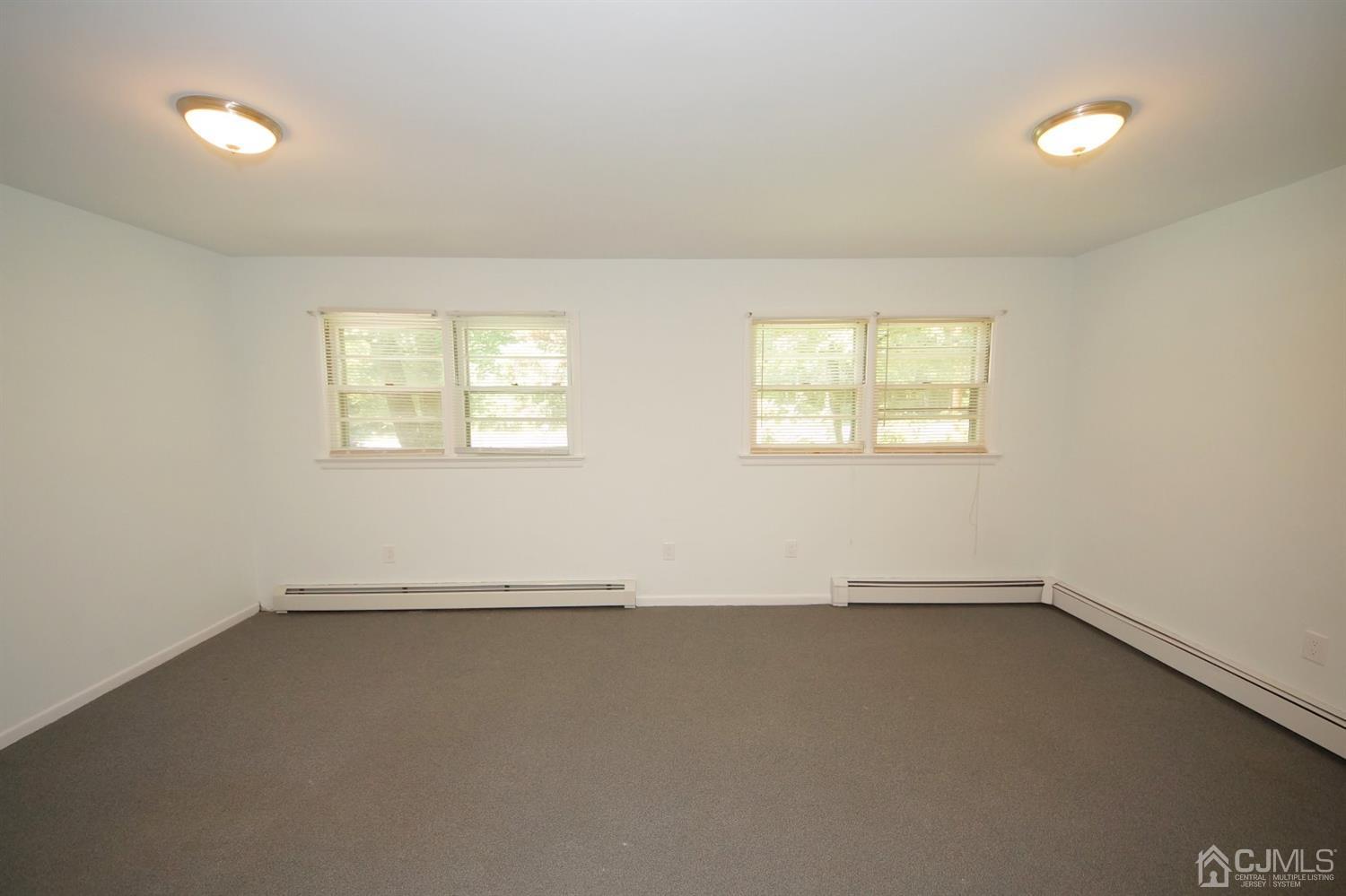238 New Road Monmouth Junction, NJ 08852 - Photo 26 of 63 an empty room with windows