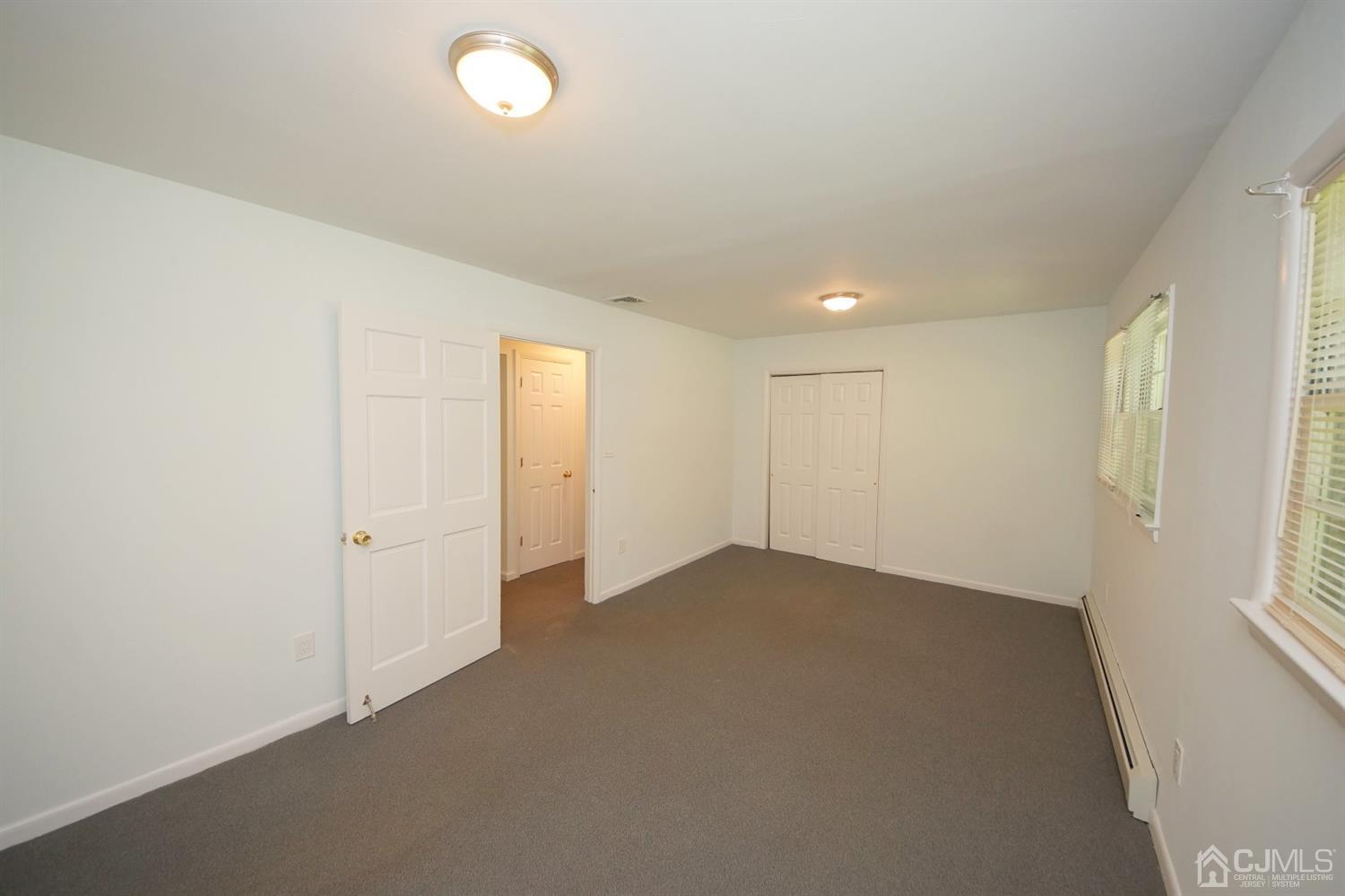 238 New Road Monmouth Junction, NJ 08852 - Photo 28 of 63 an empty room with windows