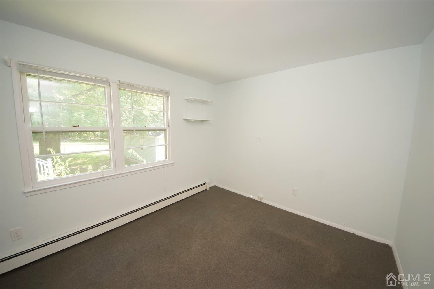 238 New Road Monmouth Junction, NJ 08852 - Photo 34 of 63 an empty room with a window