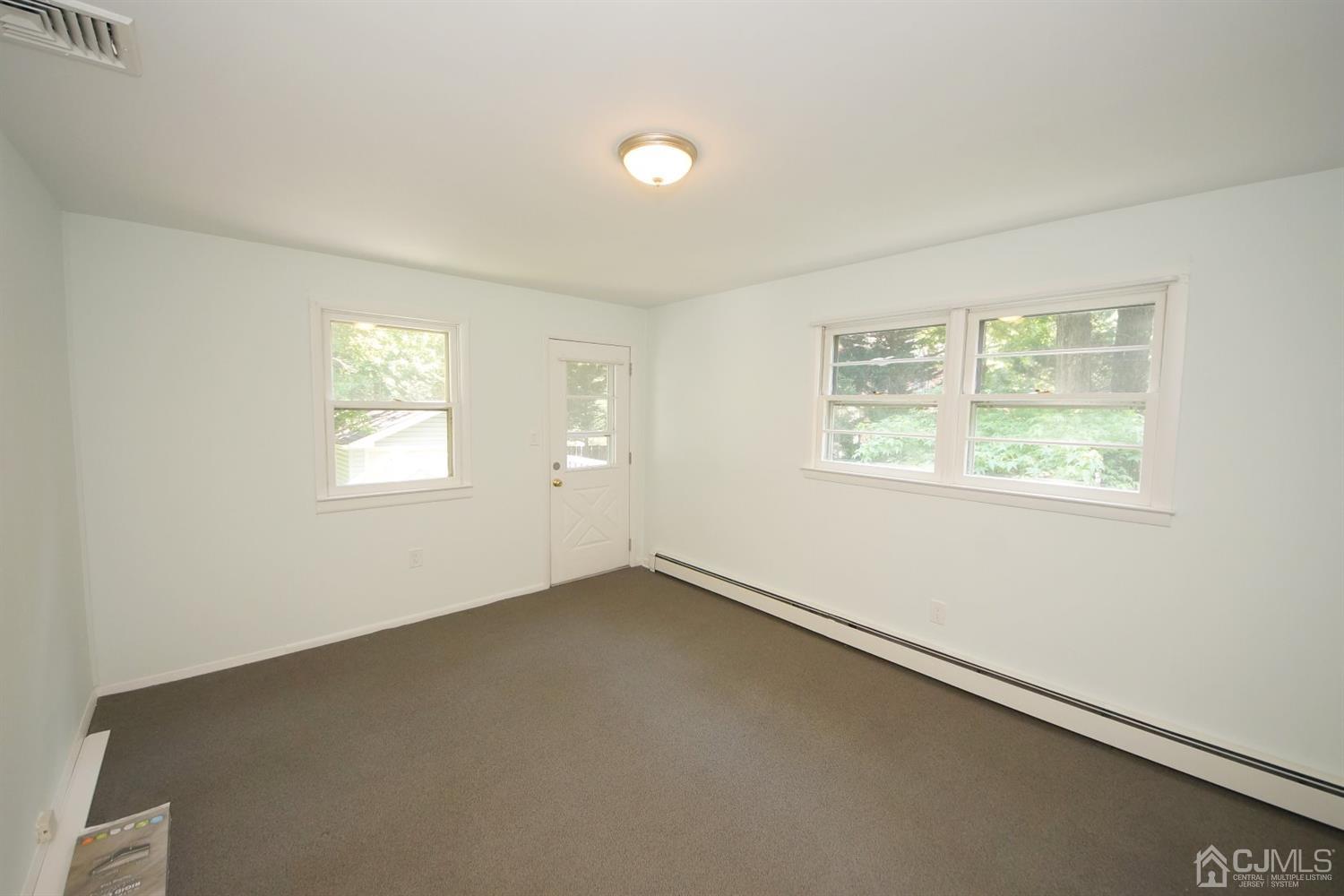 238 New Road Monmouth Junction, NJ 08852 - Photo 37 of 63 an empty room with windows