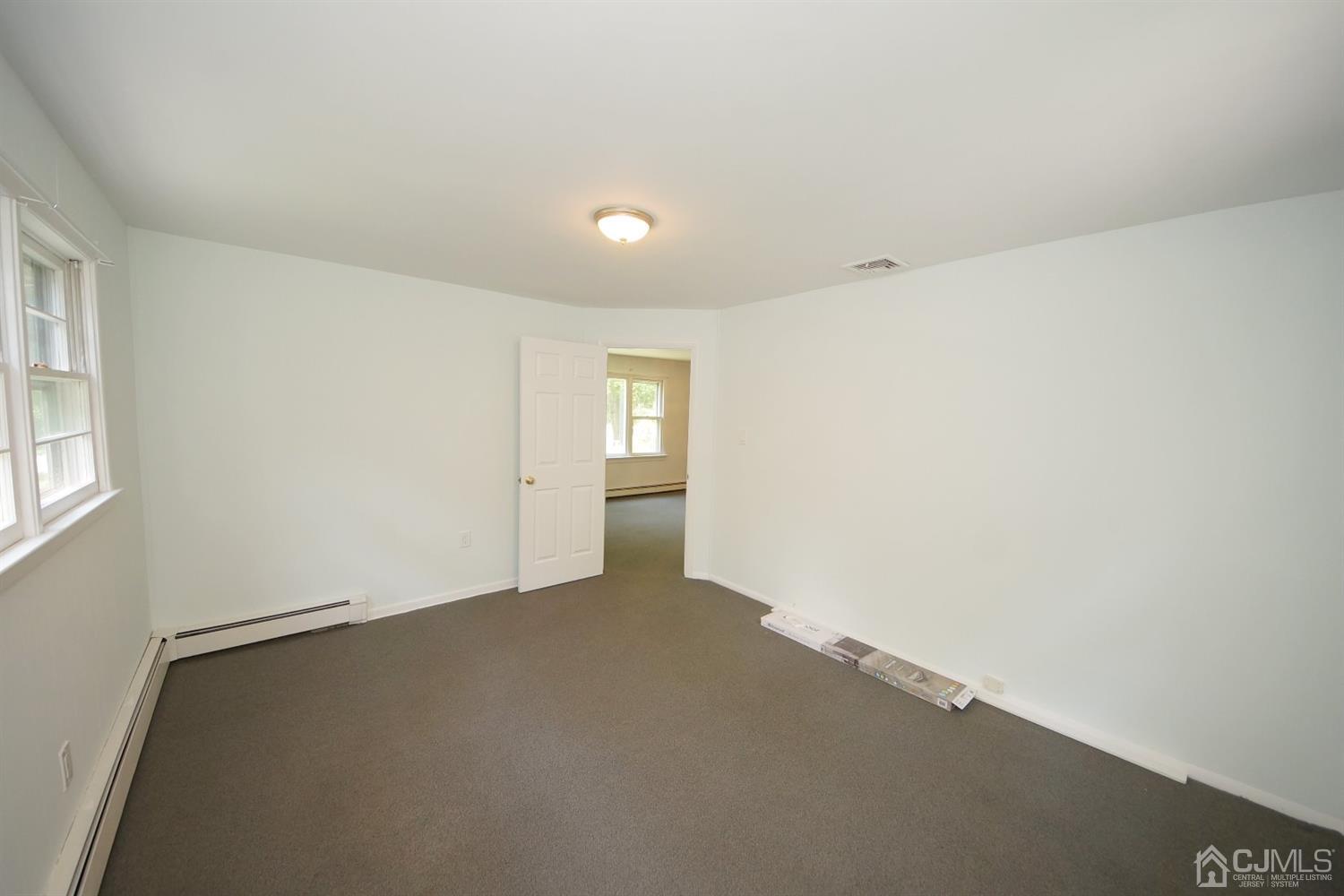 238 New Road Monmouth Junction, NJ 08852 - Photo 38 of 63 an empty room with windows