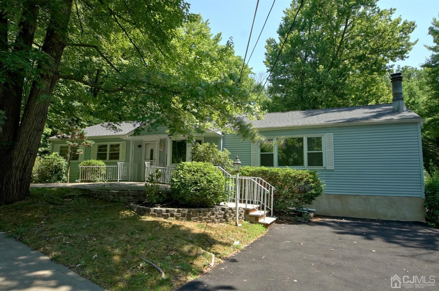 238 New Road Monmouth Junction, NJ 08852 - Photo 5 of 63 a front view of house with yard and green space